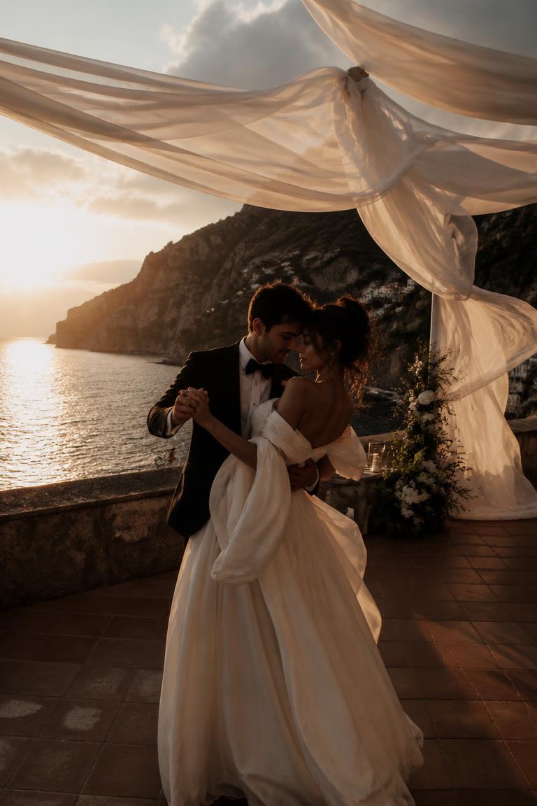 Couple dancing on a cliffside terrace above the sea